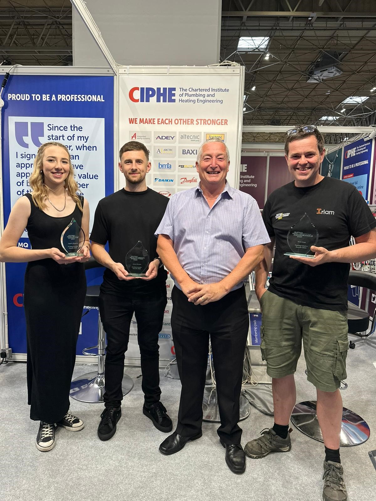 CIPHE's Jerry Whiteley with the 2023 winners of the Heating Installer Awards.