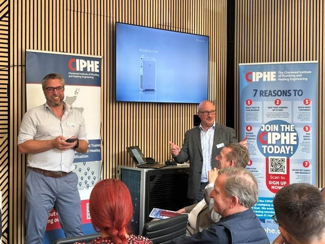 CIPHE presenting at a meeting